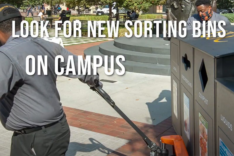 USC staff pulling recycling bins across campus