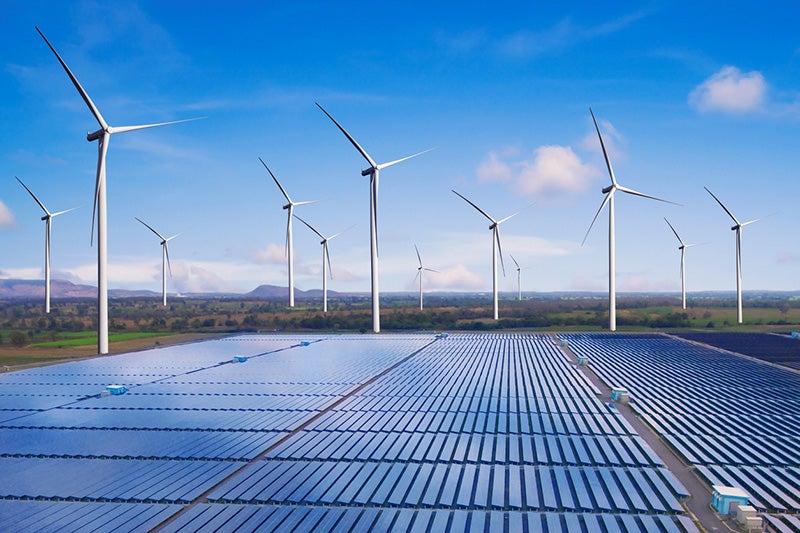 A wind farm with solar panels