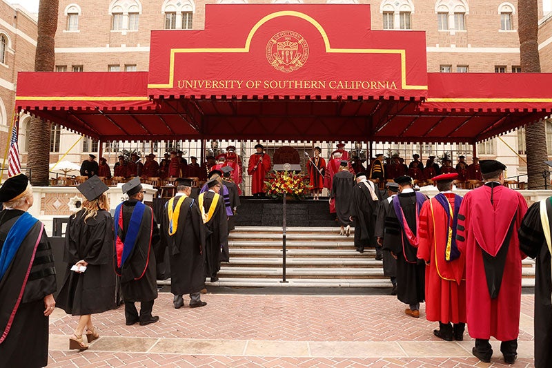 Faculty members take part in commencement. 