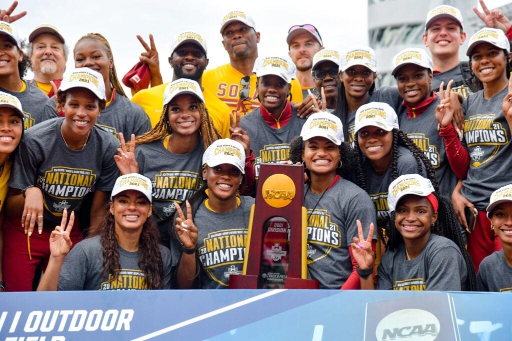 USC Track and Field team with NCAA trophy
