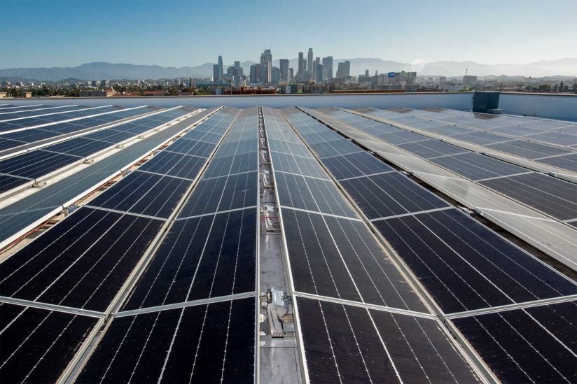 Solar panel atop Galen Center and a view of the Downtown L.A. skyline
