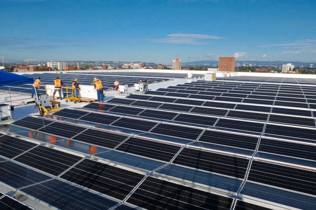 Solar panels on the roof of the Galen Center help USC reach its sustainability goals