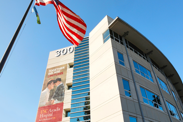 An image of USC Arcadia Hospital with the US flag