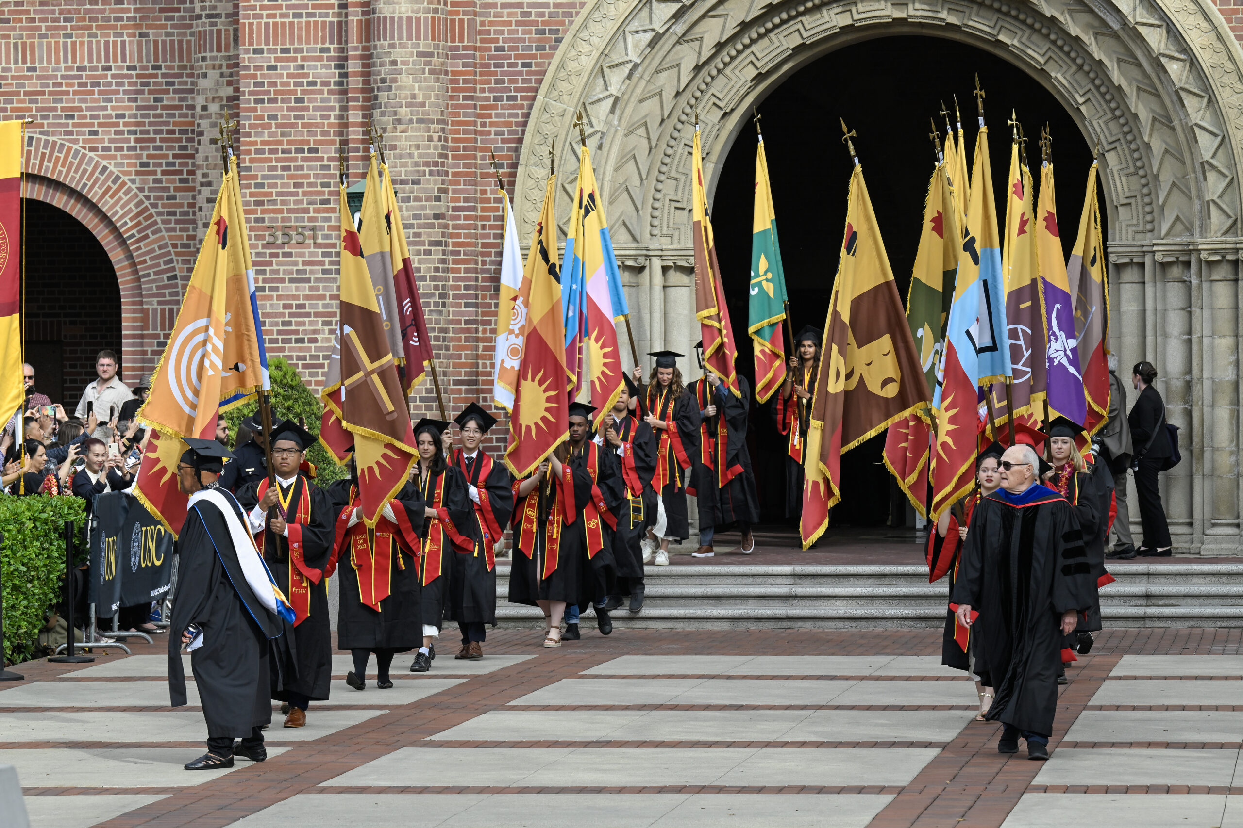 The procession marks the start of the 140th commencement ceremony at the University of Southern California, May 12, 2023. (Photo/Gus Ruelas)