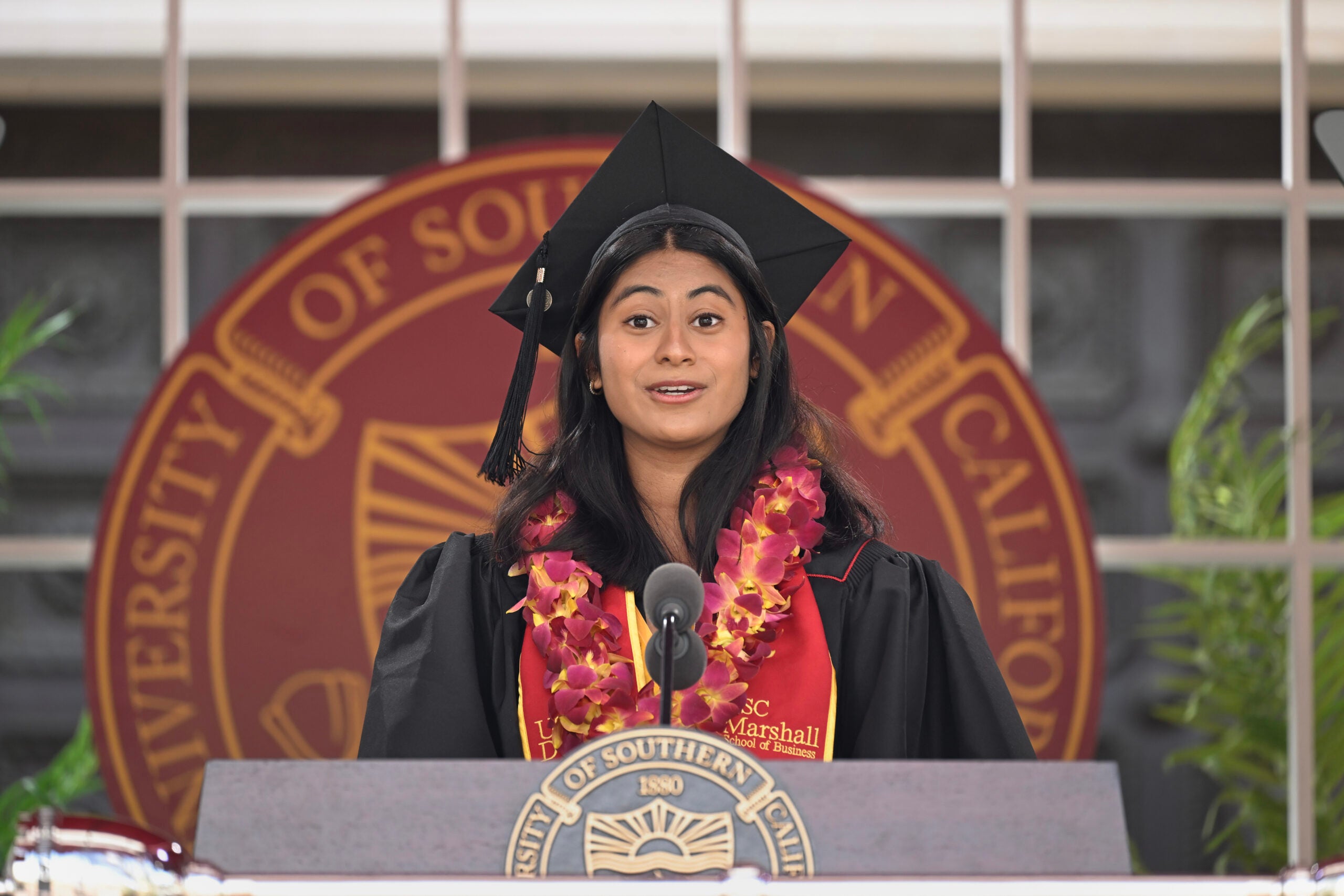 Valedictorian Isha Sanghvi speaks during the 140th commencement ceremony at the University of Southern California, May 12, 2023. (Photo/Gus Ruelas)