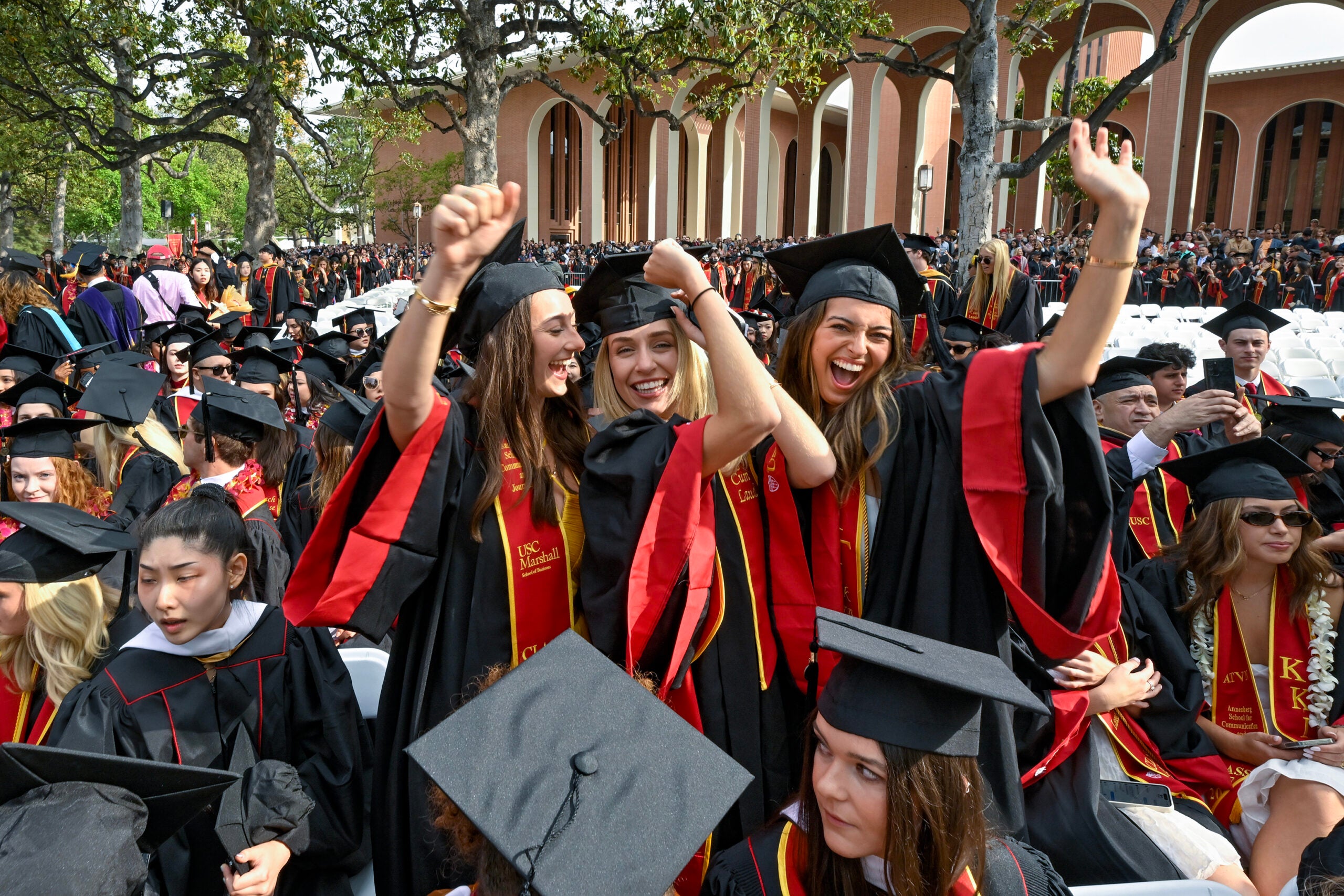 Students celebrate during the 140th commencement ceremony at the University of Southern California, May 12, 2023. (Photo/Gus Ruelas)