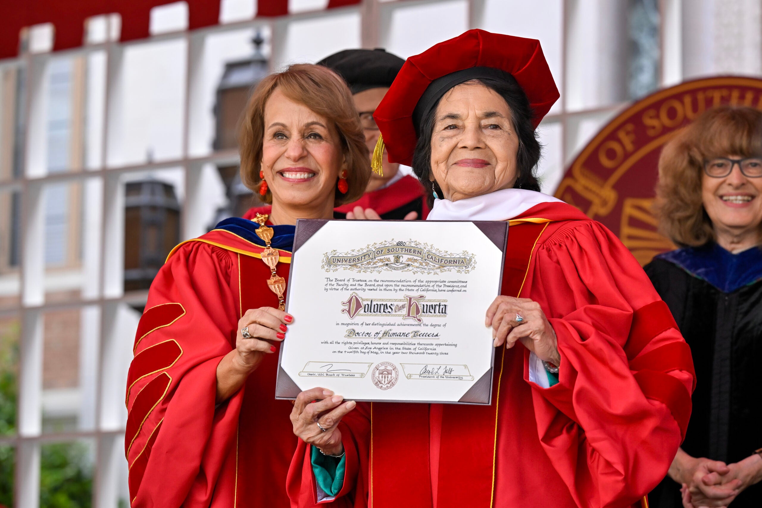 USC President Carol L. Folt presents Dolores Clara Huerta with a doctor of humane letters during the 140th commencement ceremony at the University of Southern California, May 12, 2023. (Photo/Gus Ruelas)