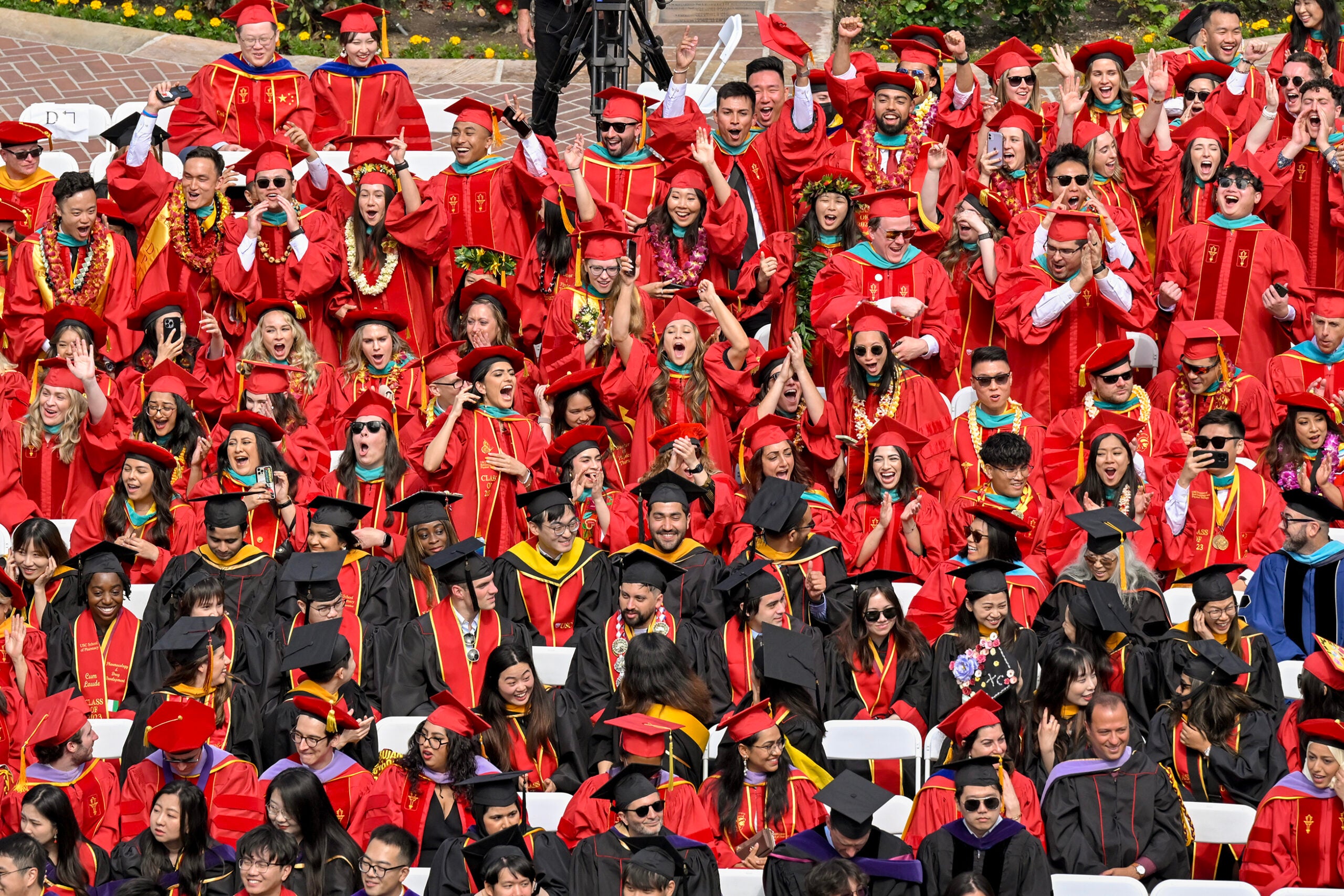 Doctoral graduates celebrate during the 140th commencement ceremony at the University of Southern California, May 12, 2023. (Photo/Gus Ruelas)